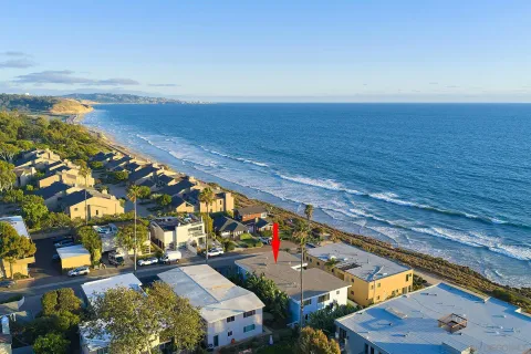 an aerial view of beach and ocean
