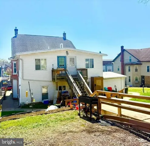 a front view of a house with swimming pool