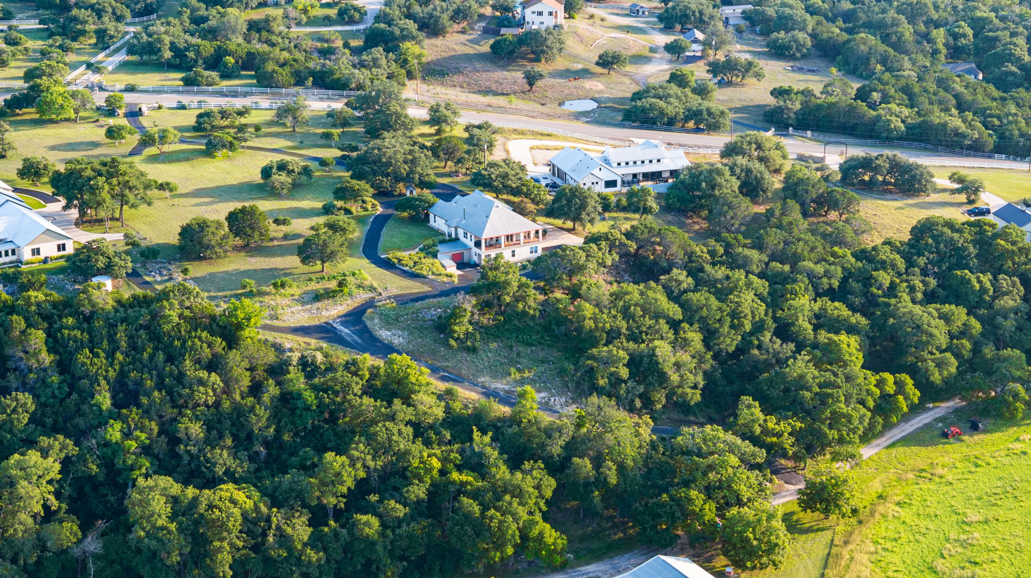 1427 River Ridge Ranch Road Killeen, TX 76549 - Photo 38 of 40 An aerial perspective reveals a private, tree-lined estate with sweeping green spaces and secluded homes.