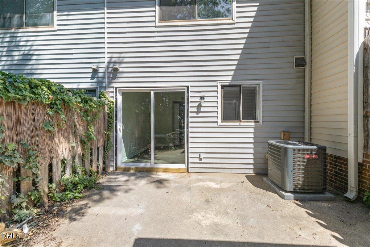 5806 Shady Grove Circle Raleigh, NC 27609 - Photo 28 of 28 a view of a house with a yard and plants