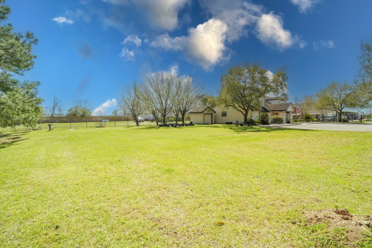 12682 Shiloh Church Road Houston, TX 77066 - Photo 18 of 25 a view of a swimming pool and an outdoor space