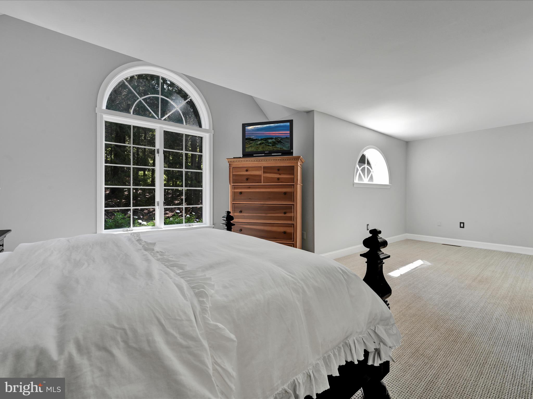 4018 Hillview Road Temple, PA 19560 - Photo 24 of 52 a bedroom with a bed and a large window
