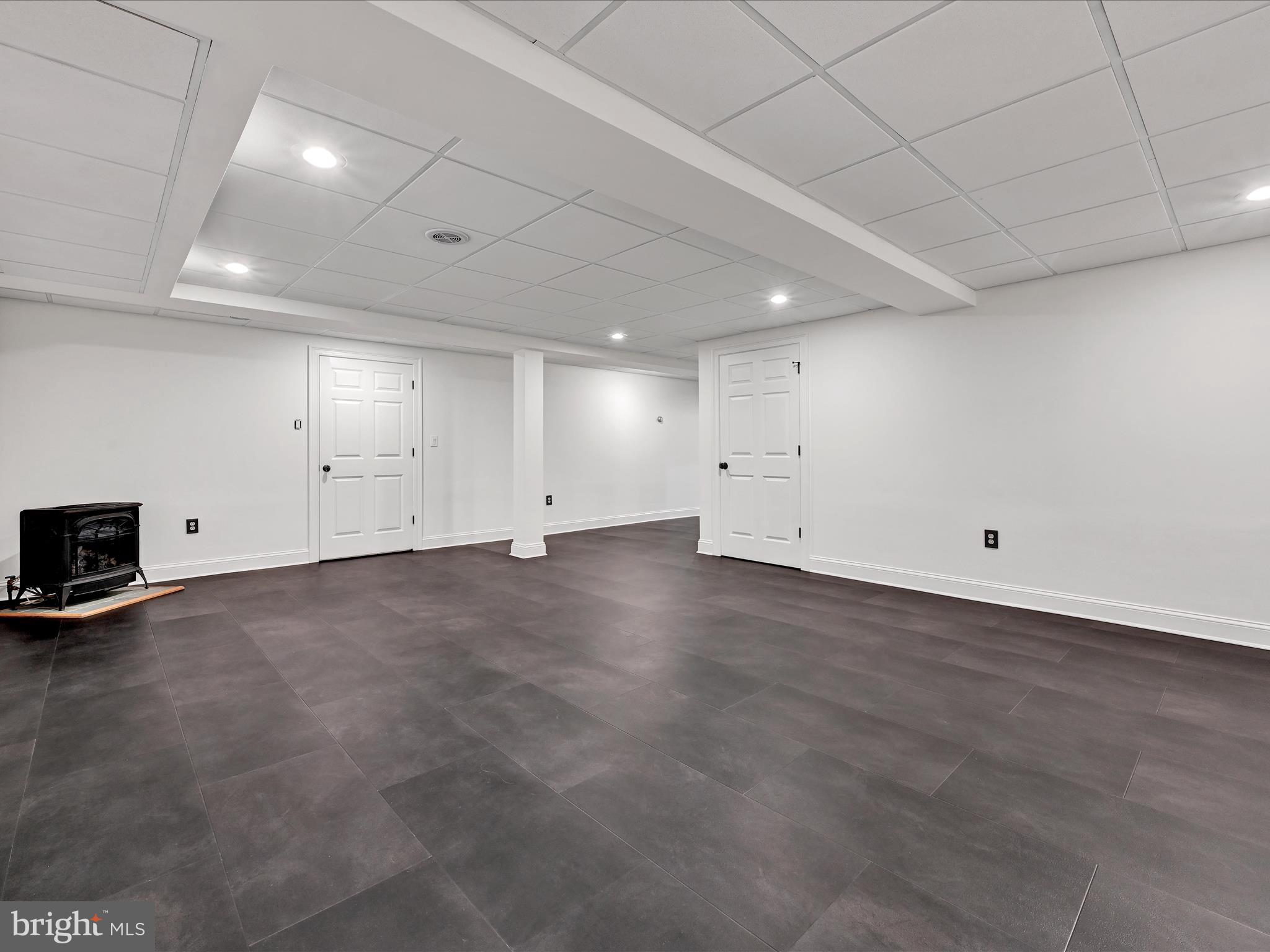 4018 Hillview Road Temple, PA 19560 - Photo 36 of 52 an empty room with wooden floor and windows