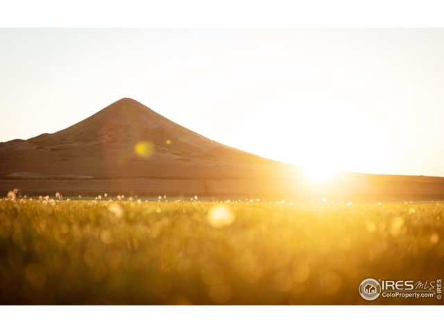 a view of a building with a street