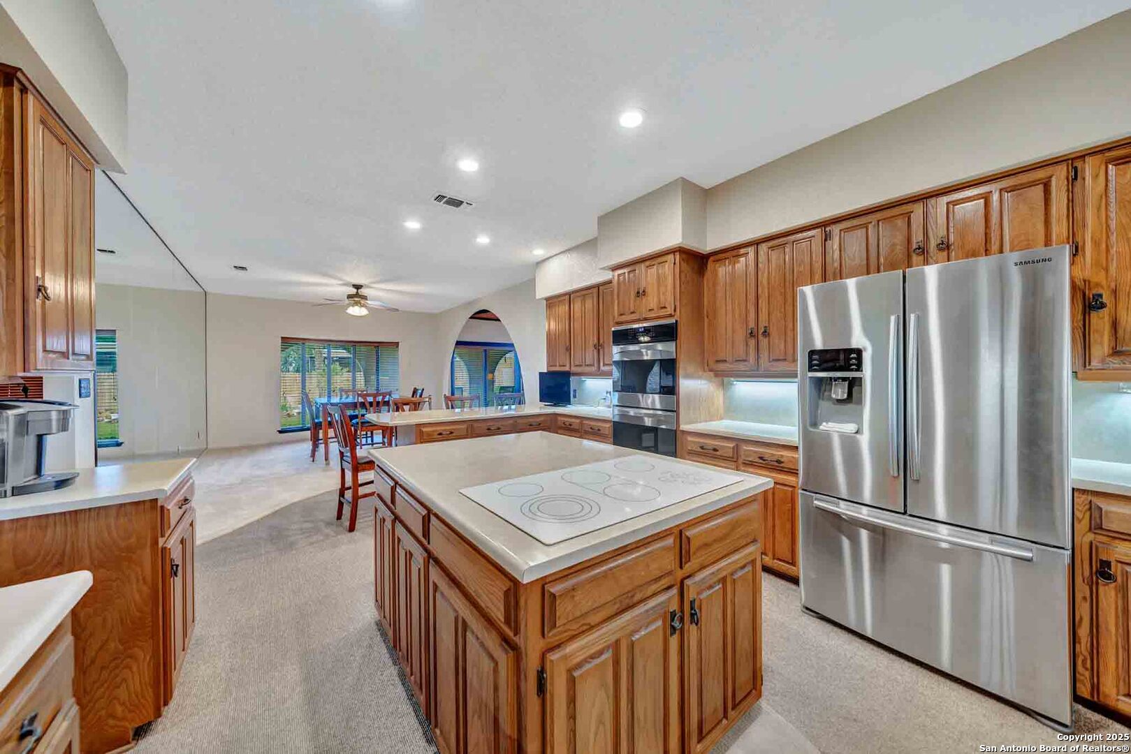 8300 Scr 314 Rocksprings, TX 78880 - Photo 34 of 74 a kitchen with stainless steel appliances a refrigerator a table and chairs