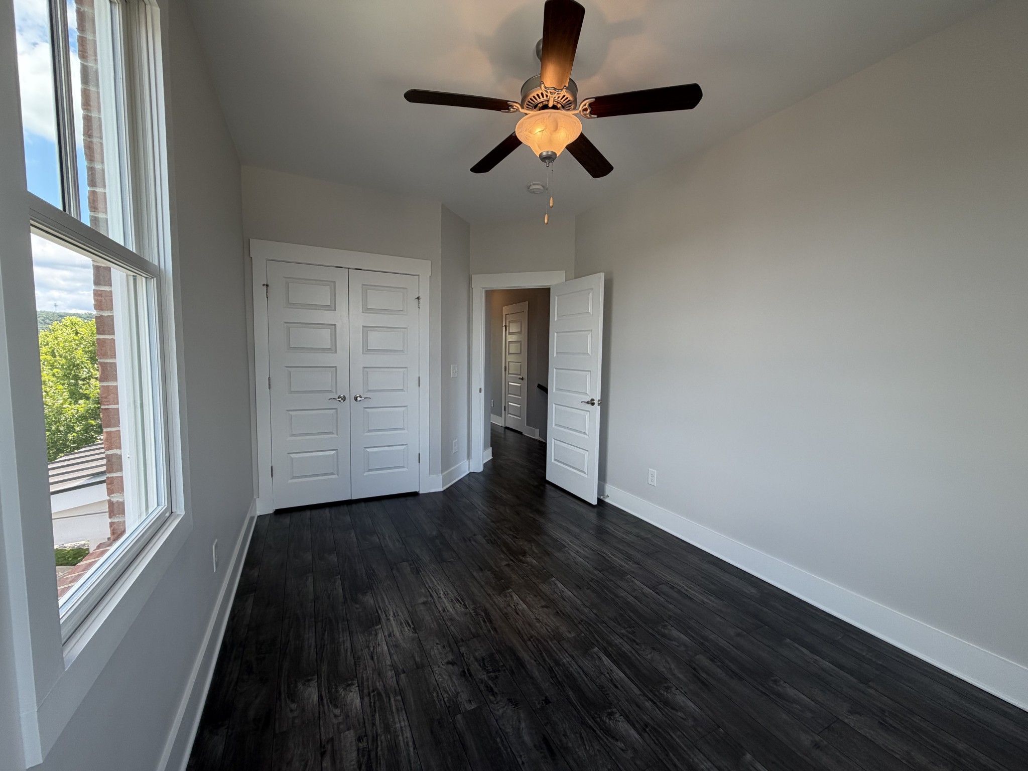 3097 Rural Plains Circle Franklin, TN 37064 - Photo 22 of 28 wooden floor in an empty room with a window