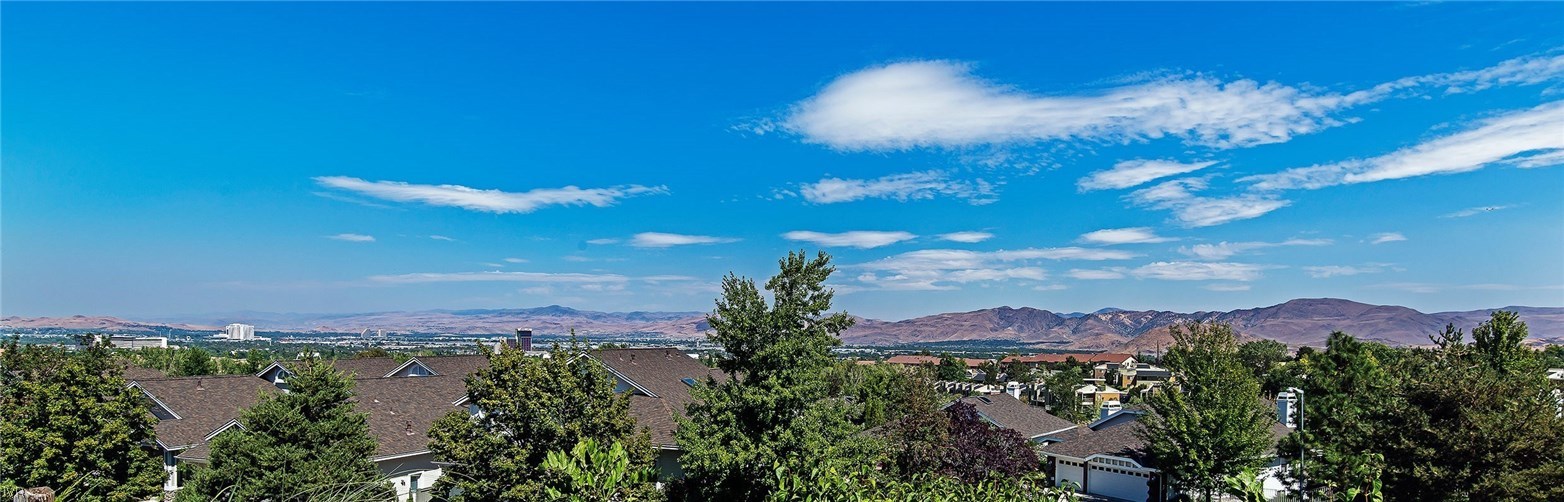 6182 Squires Lane Reno, NV 89519 - Photo 5 of 17 a view of a city with sunset in background