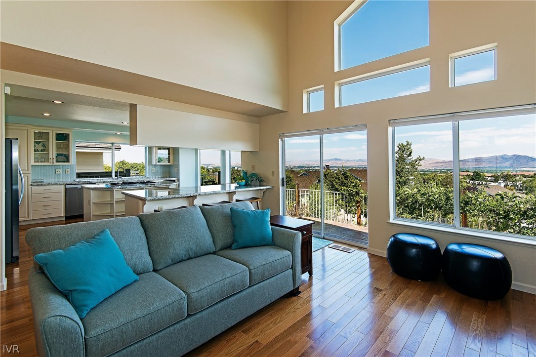 6182 Squires Lane Reno, NV 89519 - Photo 8 of 17 a living room with furniture and a large window