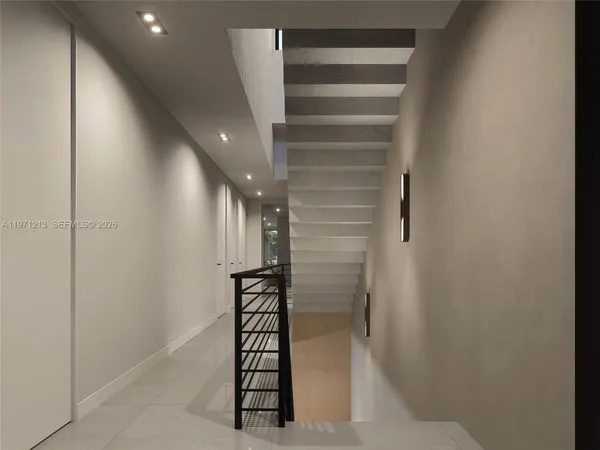 a view of entryway with stairs