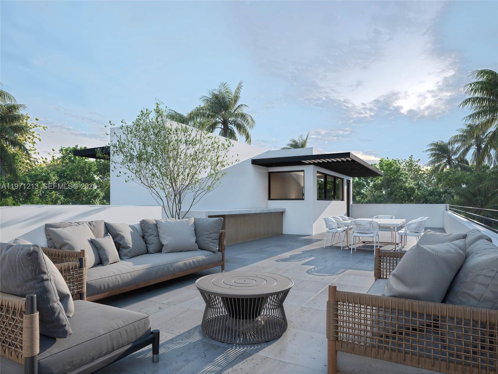 2220 Southwest 14th Street, Unit LEFT Miami, FL 33145 - Photo 15 of 17 a view of house with couch and outdoor seating