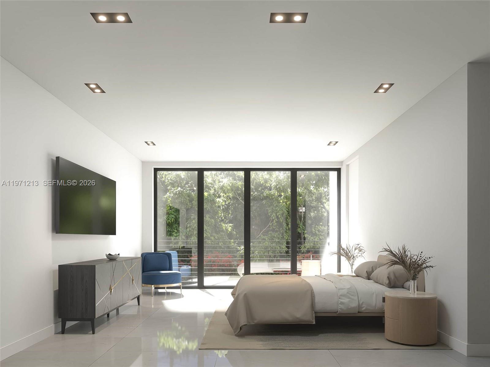 2220 Southwest 14th Street, Unit LEFT Miami, FL 33145 - Photo 9 of 17 a living room with couch a flat screen tv and a floor to ceiling window
