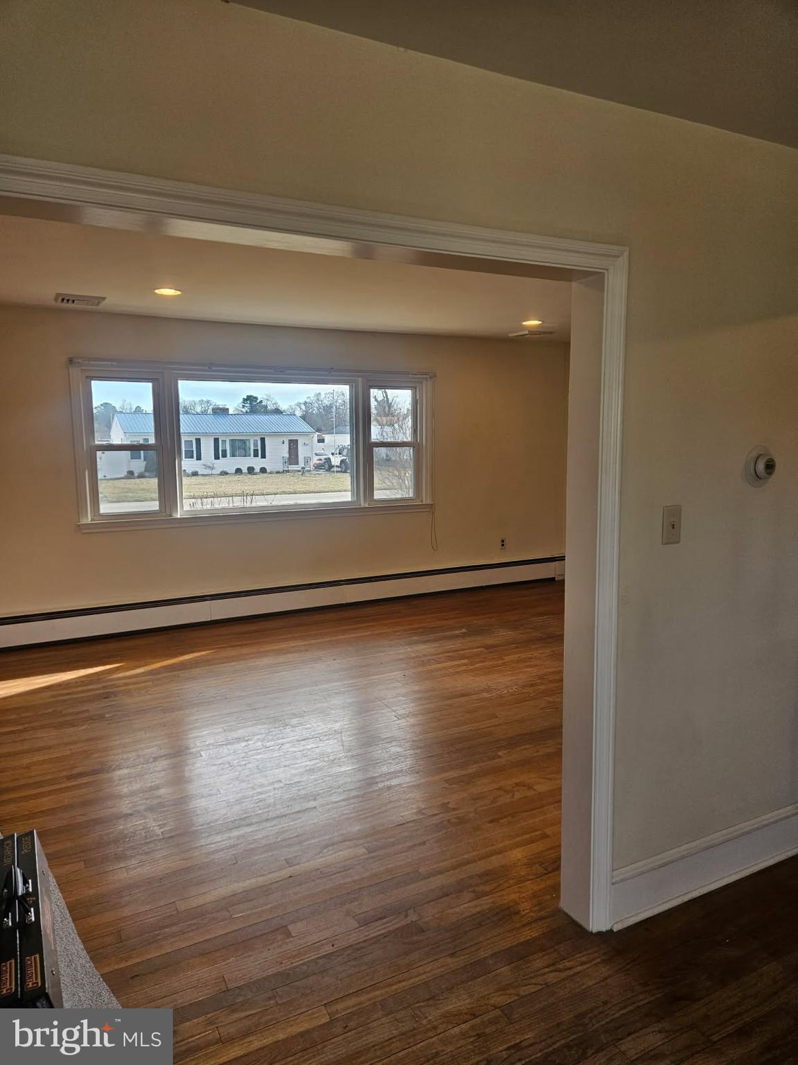 21 Manor Drive Dover, DE 19901 - Photo 16 of 24 a view of room with window and wooden floor