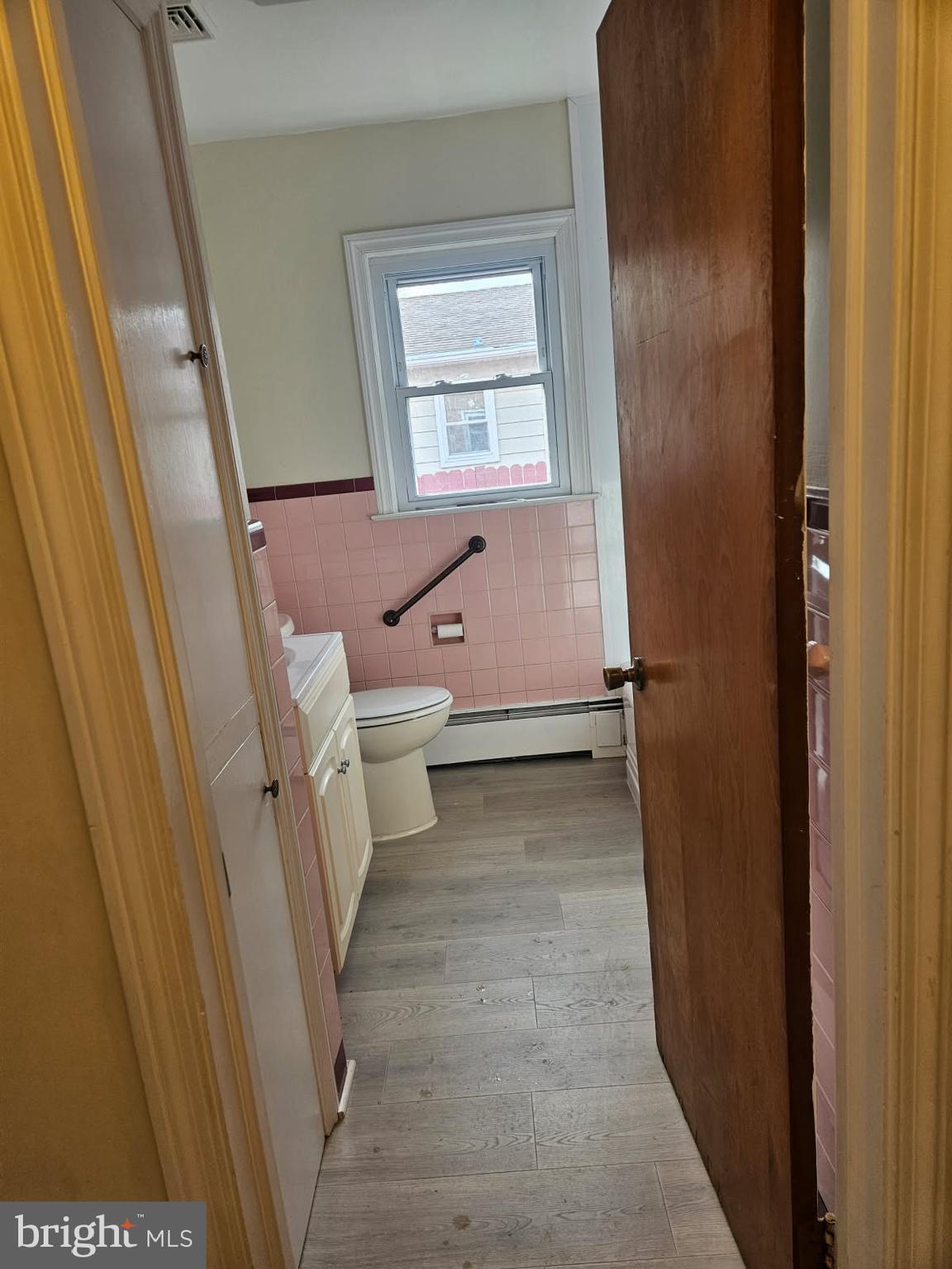 21 Manor Drive Dover, DE 19901 - Photo 2 of 24 a bathroom with a toilet and a shower