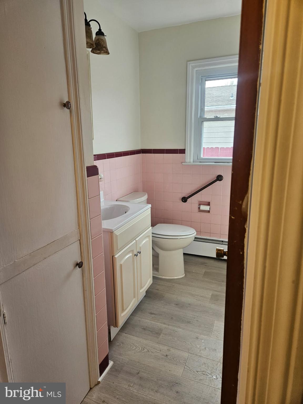 21 Manor Drive Dover, DE 19901 - Photo 3 of 24 a bathroom with a granite countertop toilet a sink and a mirror