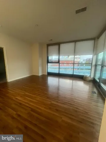a bathroom with a double vanity sink toilet and a mirror