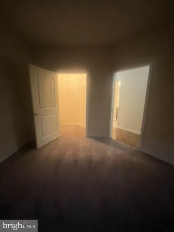 a kitchen with stainless steel appliances kitchen island sink refrigerator and stove