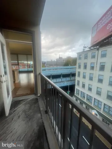 a kitchen with a sink and a mirror
