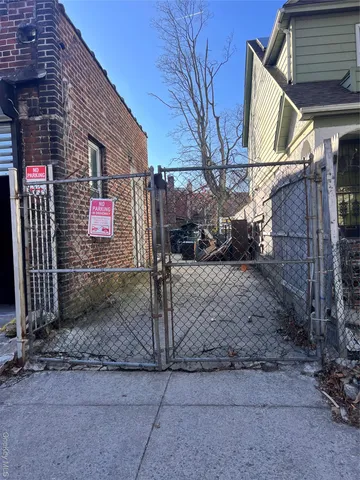 a view of a hallway with seating area