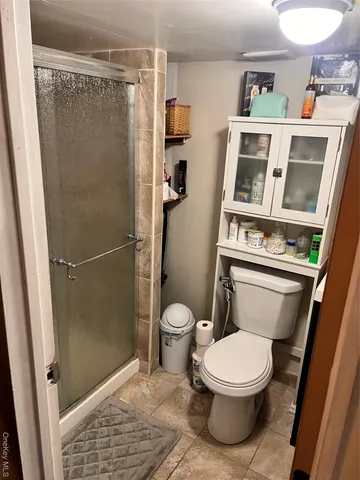 a kitchen with stainless steel appliances a stove a sink and a refrigerator