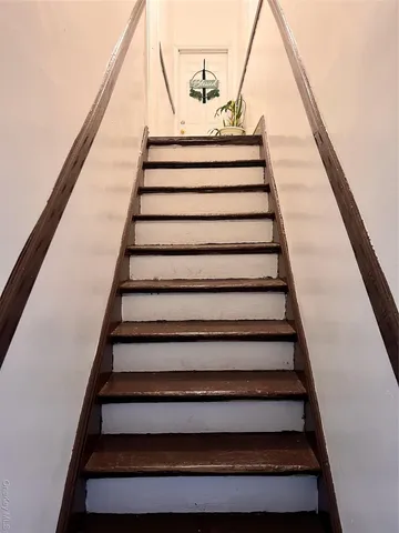 a tall building on the side of a street