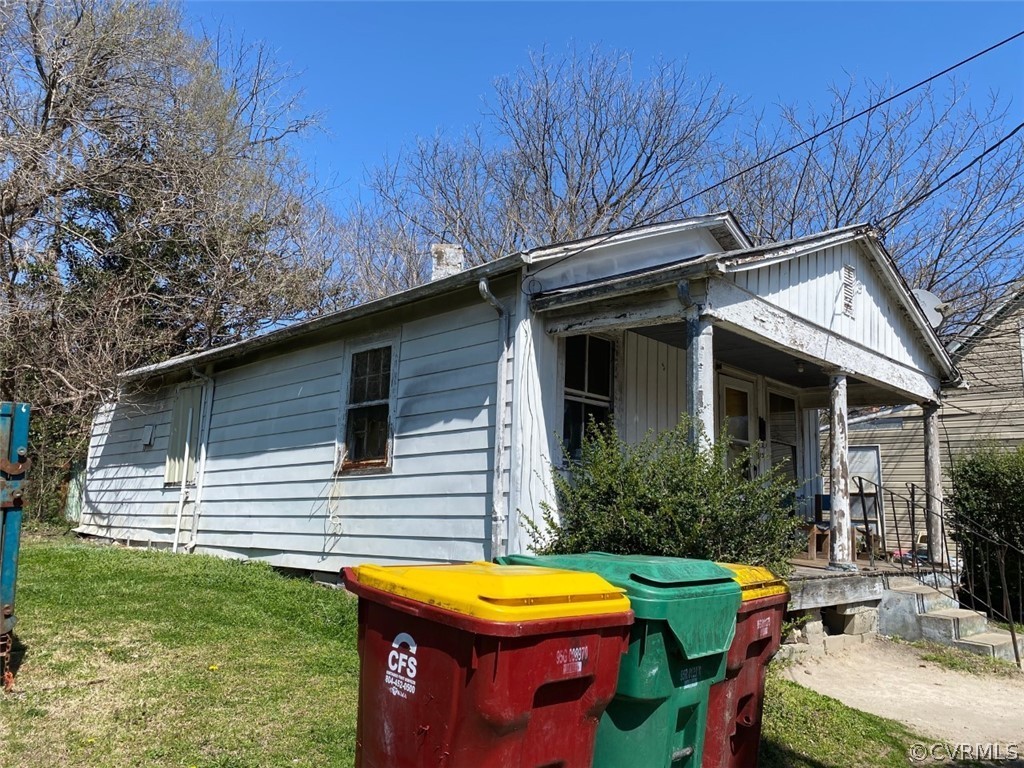 123 Mars Street Petersburg, VA 23803 - Photo 2 of 6 a view of a house with pool and chairs