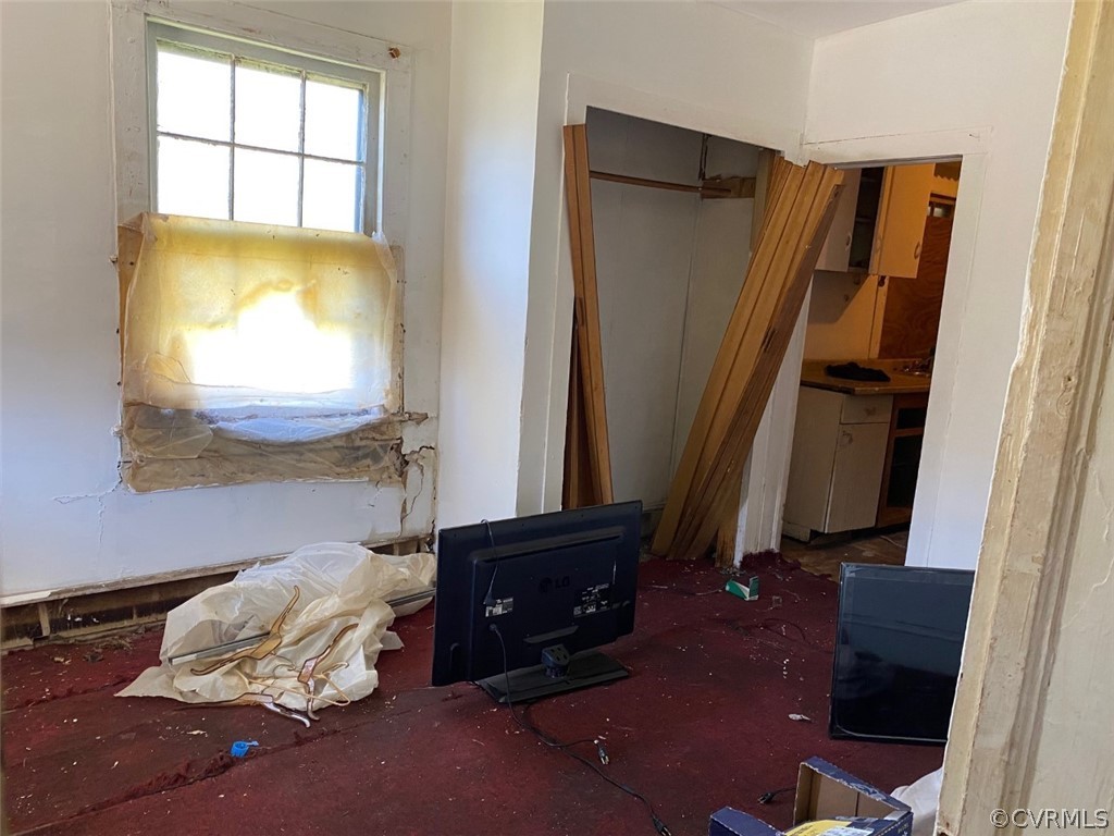 123 Mars Street Petersburg, VA 23803 - Photo 5 of 6 a living room with furniture and a window