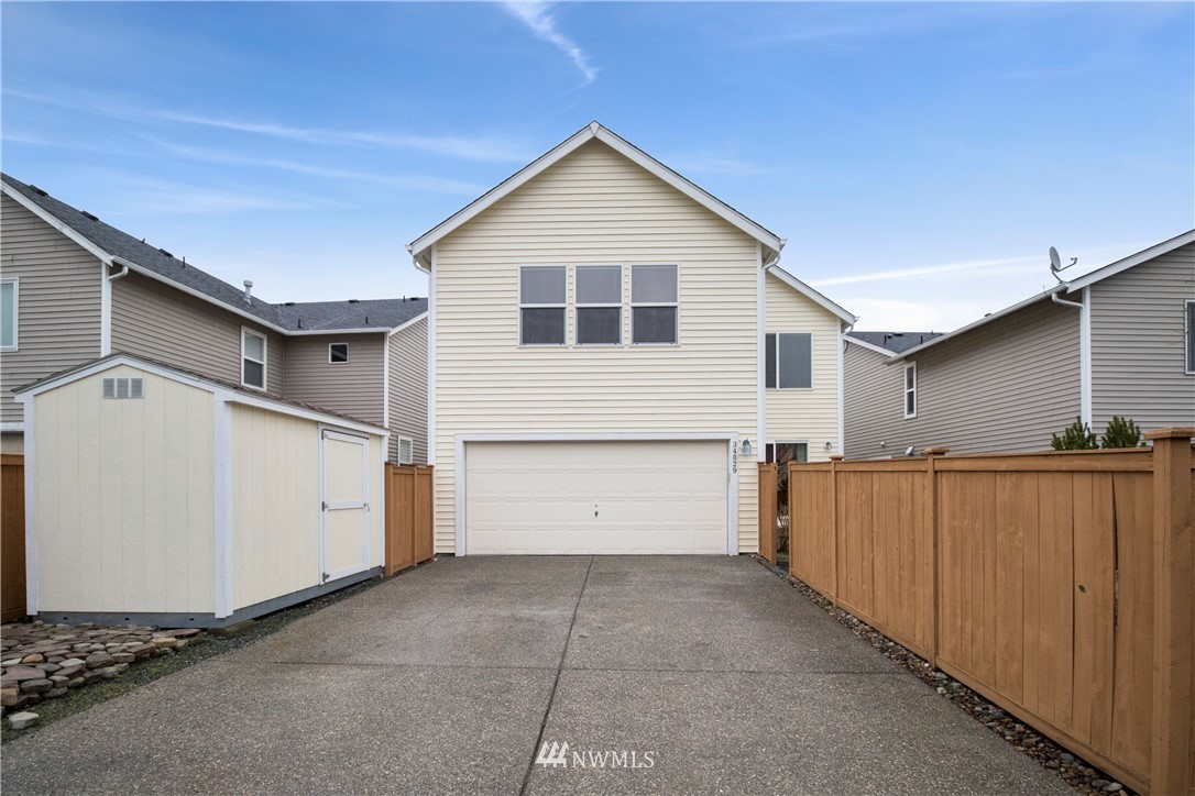 34829 Southeast Ridge Street Snoqualmie, WA 98065 - Photo 13 of 19 a view of a house with a garage