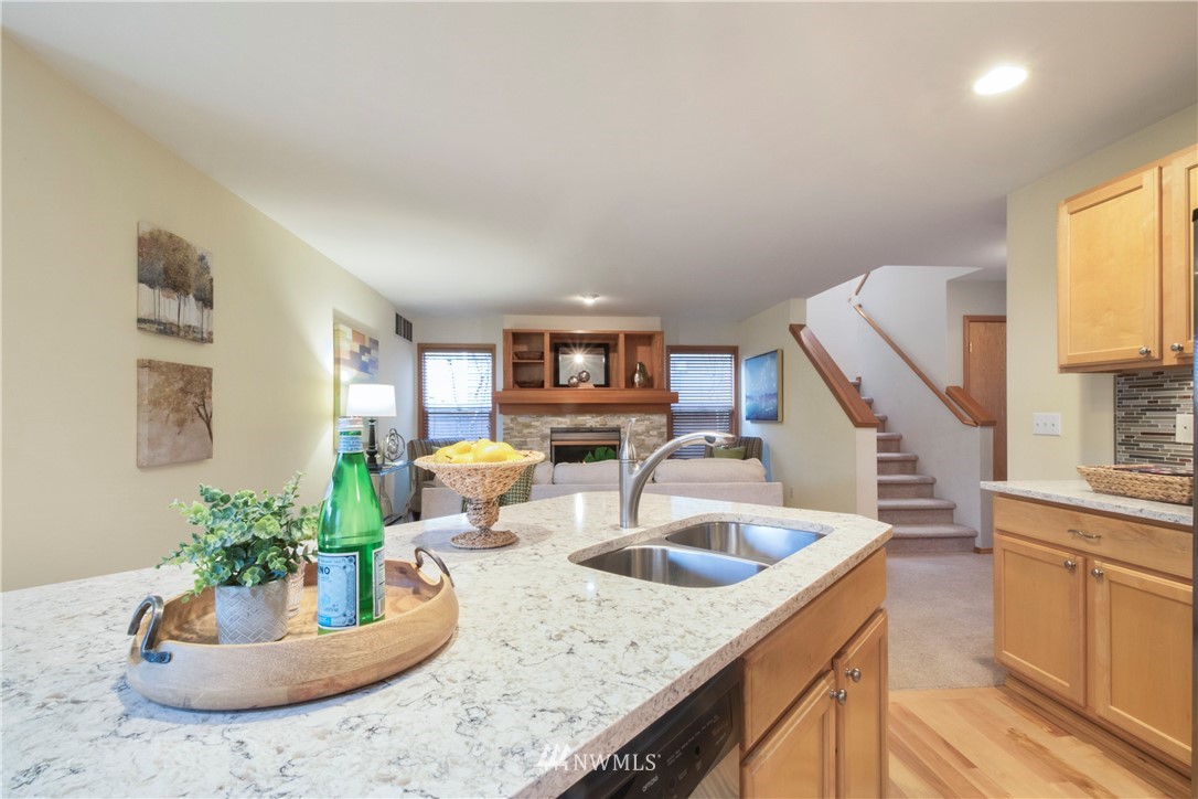 34829 Southeast Ridge Street Snoqualmie, WA 98065 - Photo 4 of 19 a kitchen with a sink and a microwave