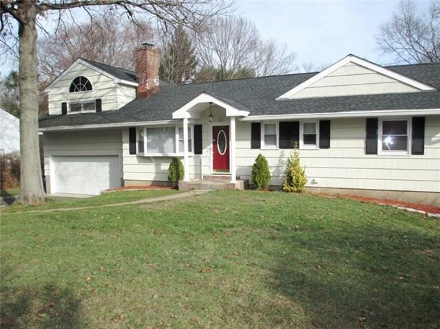 20 Cornwall Road Norwalk, CT 06850 - Photo 1 of 1 a front view of a house with garden