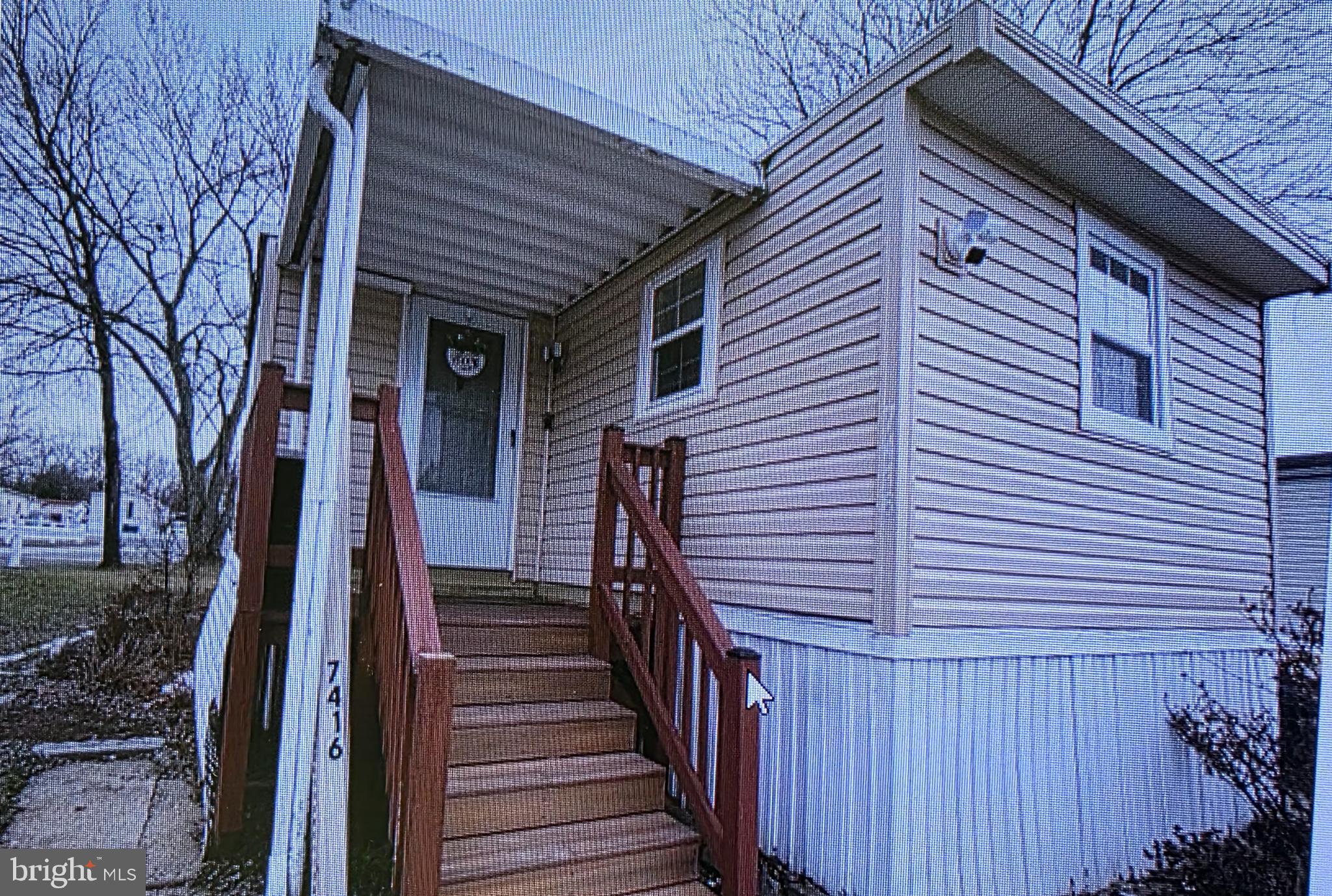 7416 Backus Lane Manassas, VA 20111 - Photo 1 of 1 a view of a house with a large door