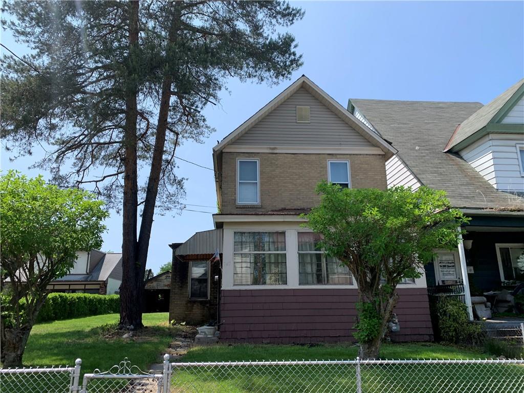 747 Frederick Street McKees Rocks, PA 15136 - Photo 1 of 25 front view of house with a yard