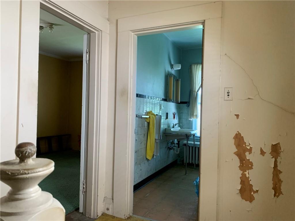 747 Frederick Street McKees Rocks, PA 15136 - Photo 11 of 25 a bathroom with a toilet and a sink