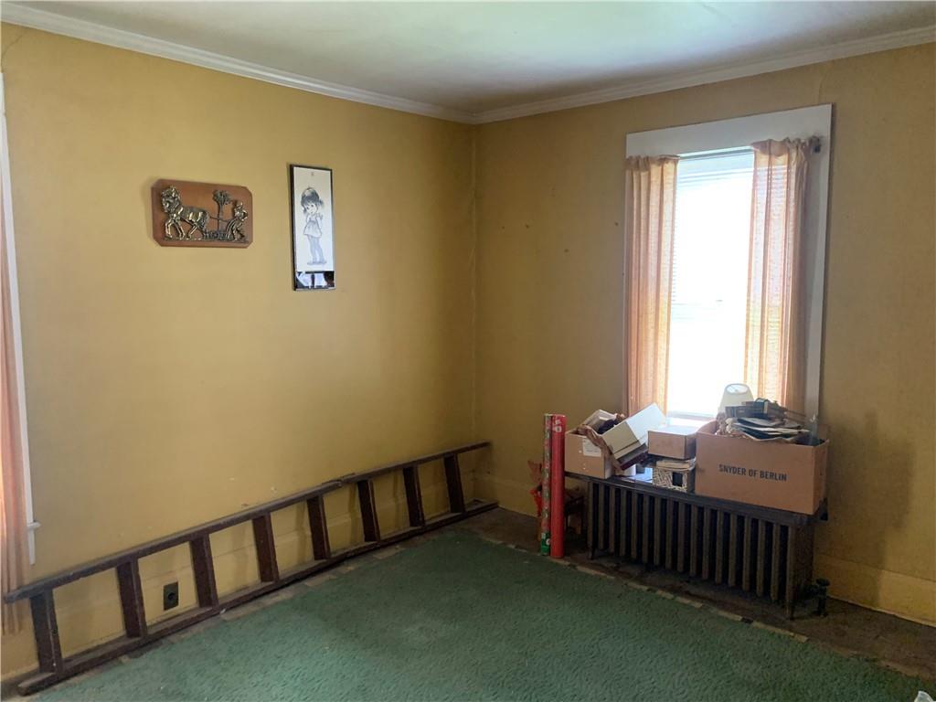 747 Frederick Street McKees Rocks, PA 15136 - Photo 14 of 25 a bed room with furniture and a window