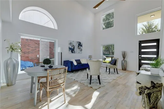 a work room with furniture and wooden floor