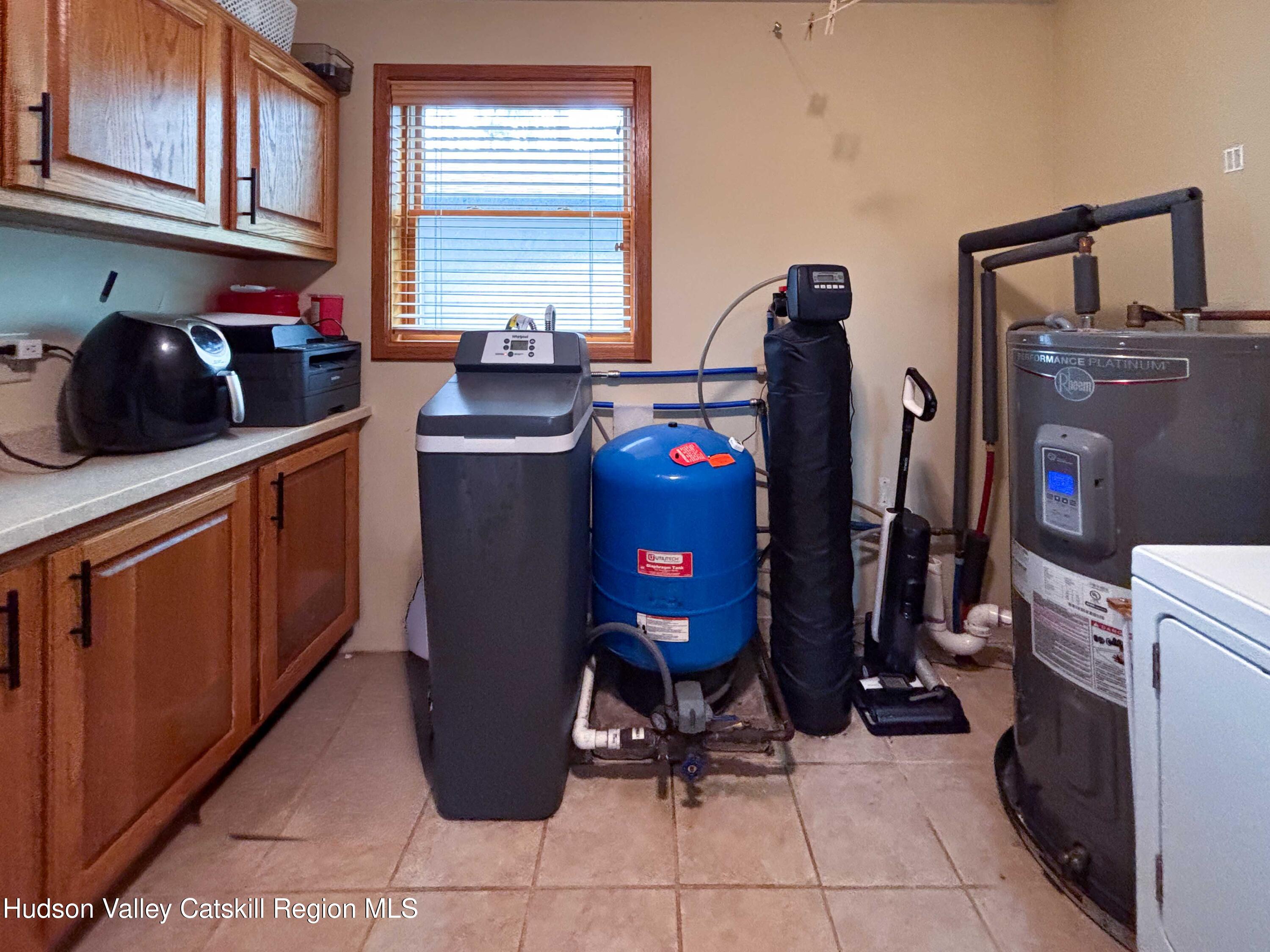 736 Plattekill Road Freehold, NY 12431 - Photo 28 of 47 a view of a kitchen with fridge and workspace