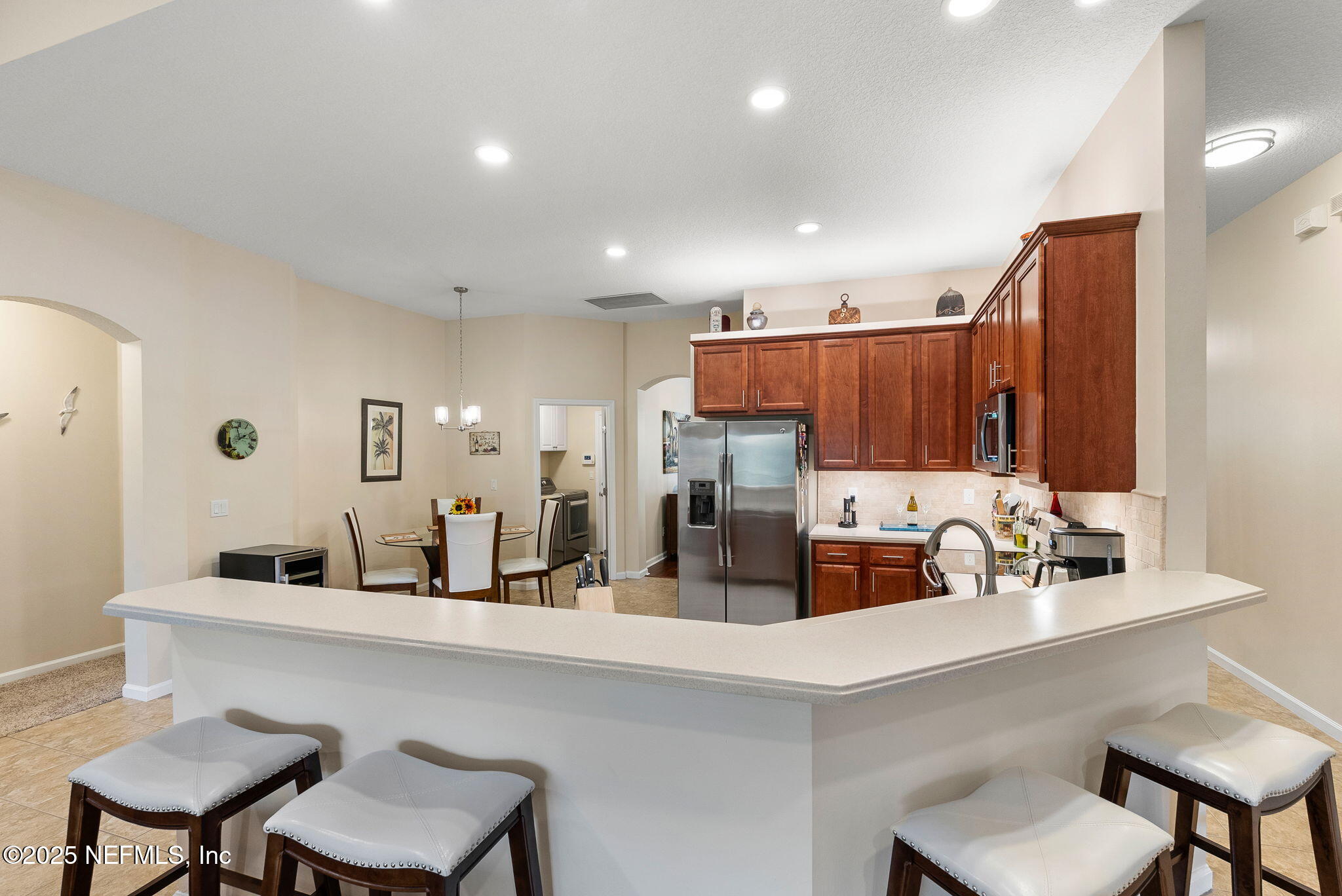 1428 Riva Del Garda Way St. Augustine, FL 32092 - Photo 12 of 44 a kitchen with a sink cabinets and window