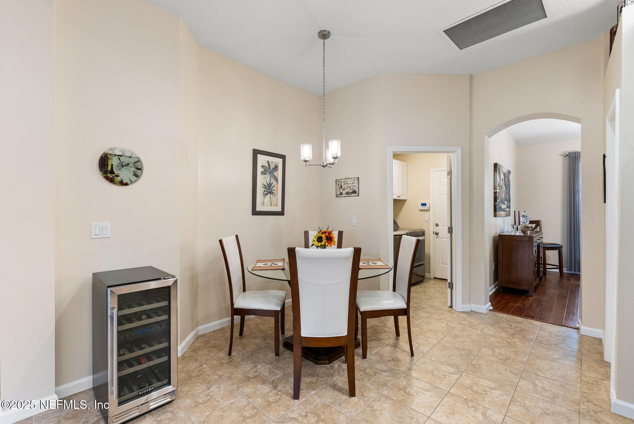 1428 Riva Del Garda Way St. Augustine, FL 32092 - Photo 13 of 44 a view of a dining room with furniture