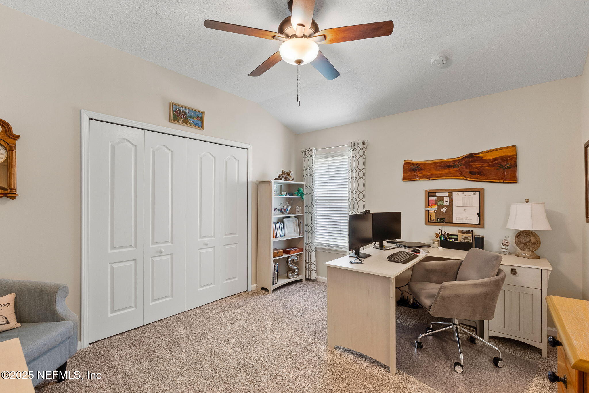 1428 Riva Del Garda Way St. Augustine, FL 32092 - Photo 30 of 44 a view of a workspace with furniture and a window