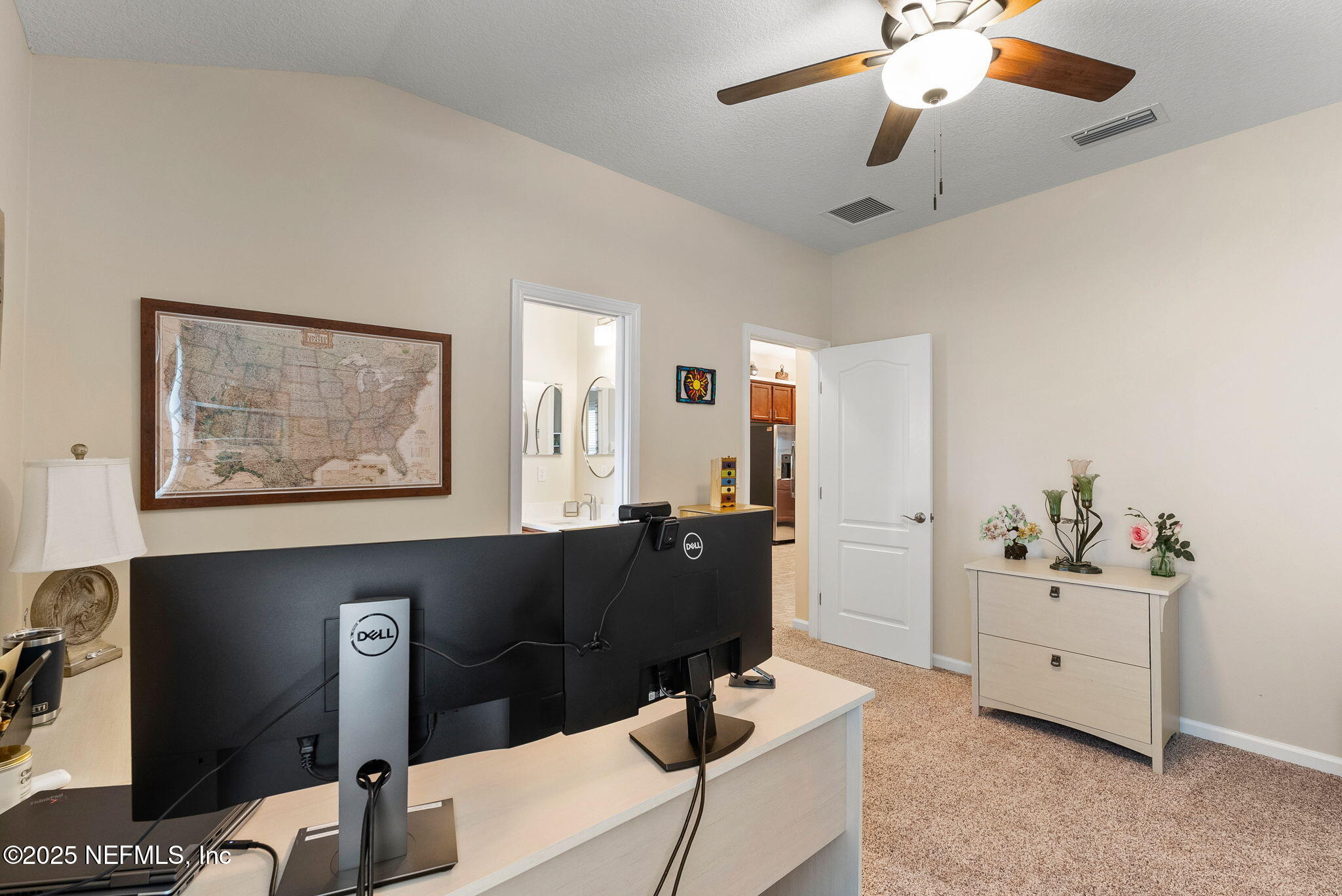 1428 Riva Del Garda Way St. Augustine, FL 32092 - Photo 31 of 44 a living room with furniture and wooden floor