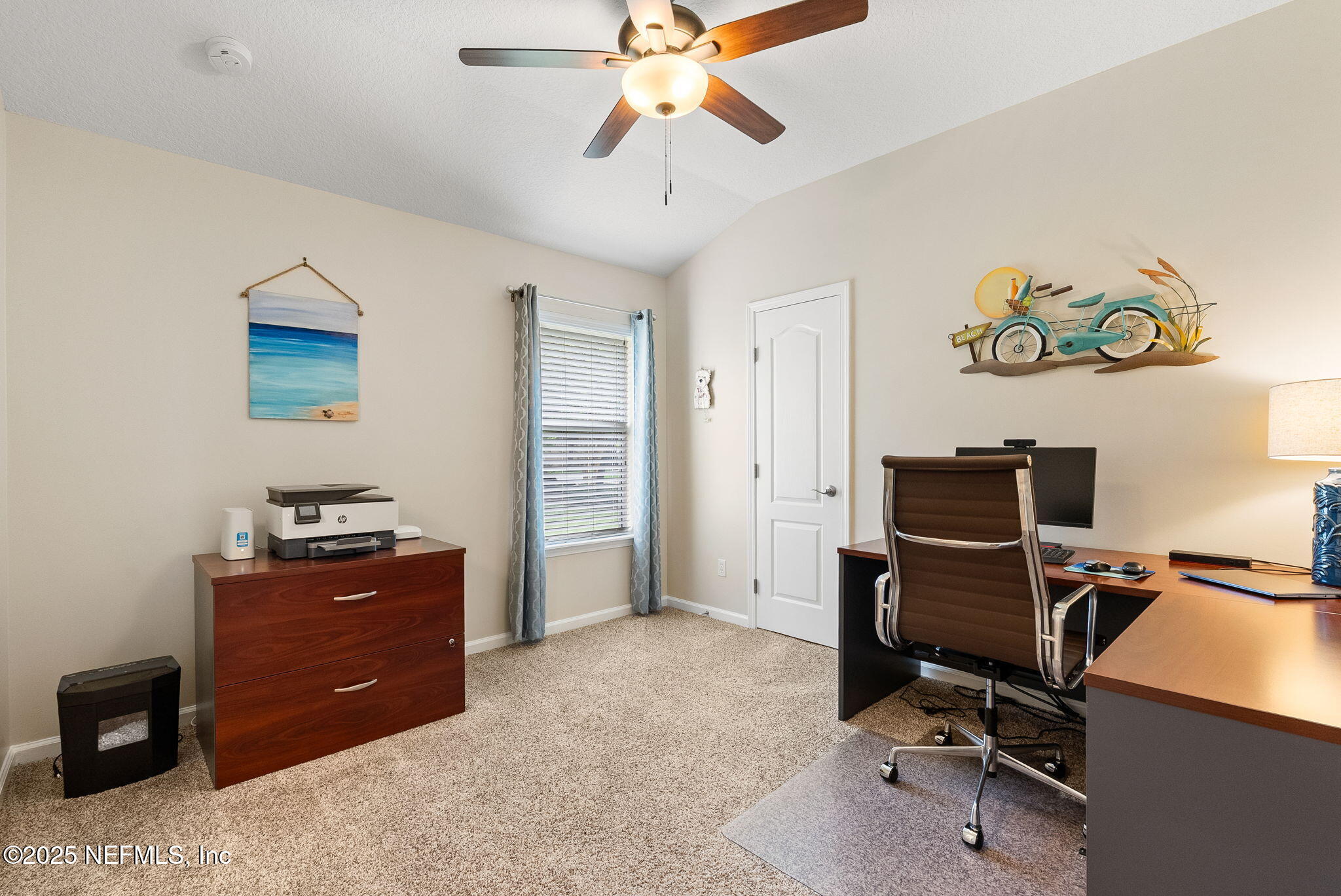 1428 Riva Del Garda Way St. Augustine, FL 32092 - Photo 33 of 44 a bedroom with a workspace