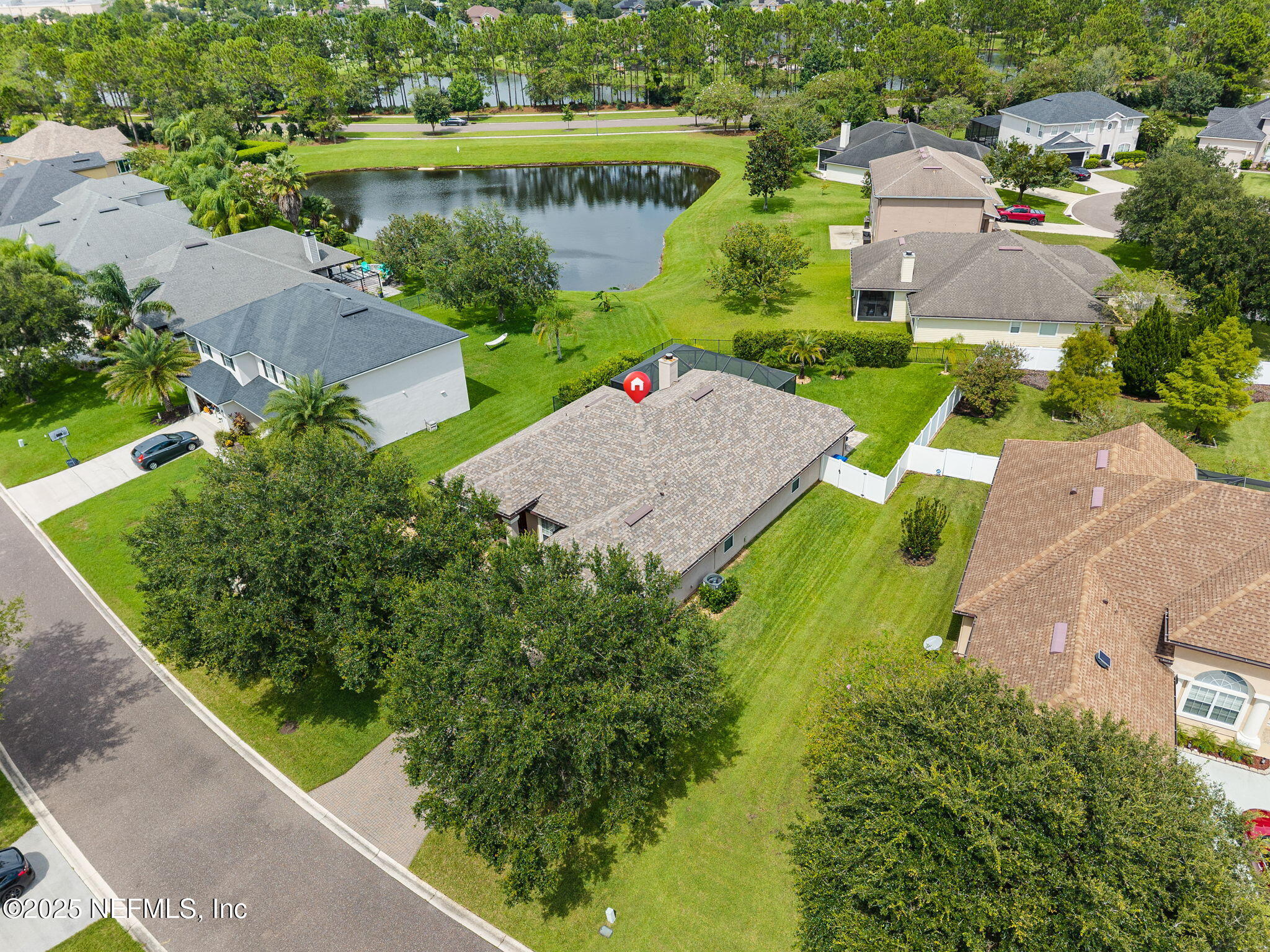 1428 Riva Del Garda Way St. Augustine, FL 32092 - Photo 42 of 44 an aerial view of a house with a garden and lake view