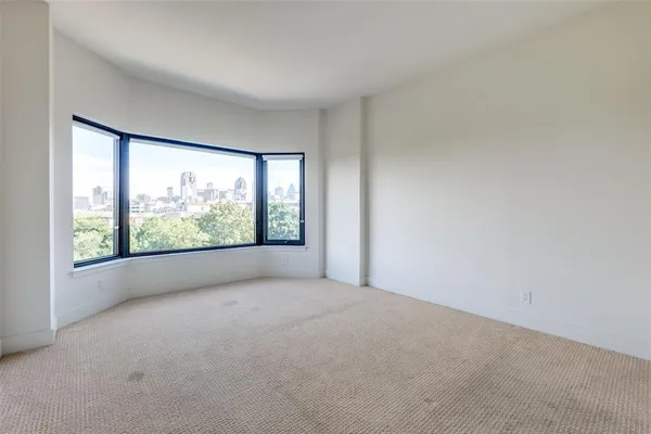 a view of a big room with large windows