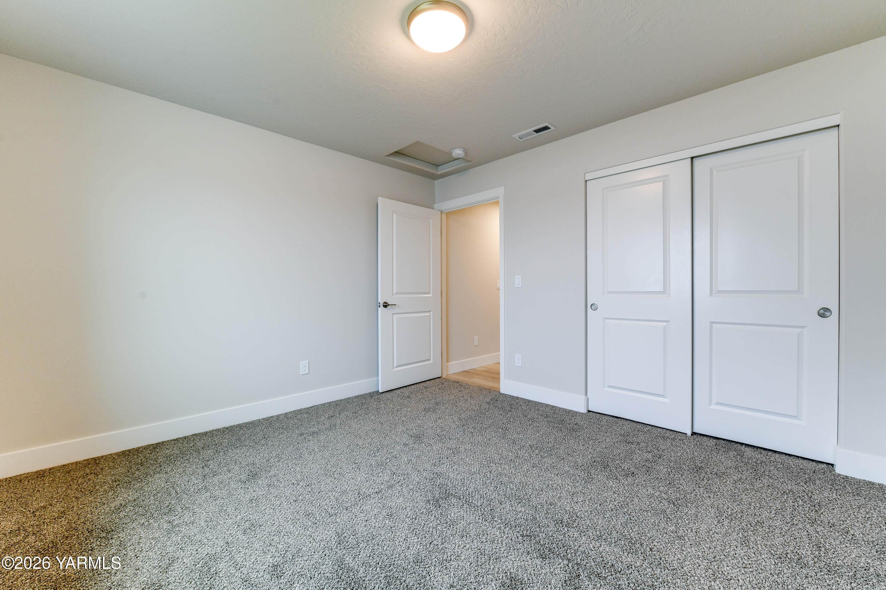 903 North Euclid Road, Unit PHASE 1 LOT 8) SPEC Grandview, WA 98930 - Photo 9 of 25 a view of an empty room