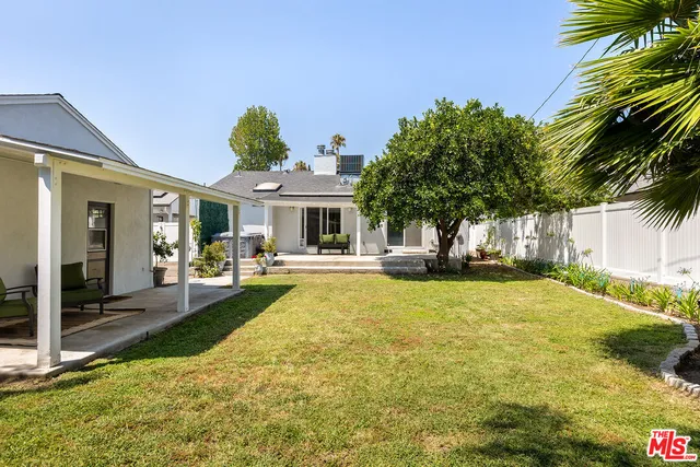 a front view of a house with swimming pool
