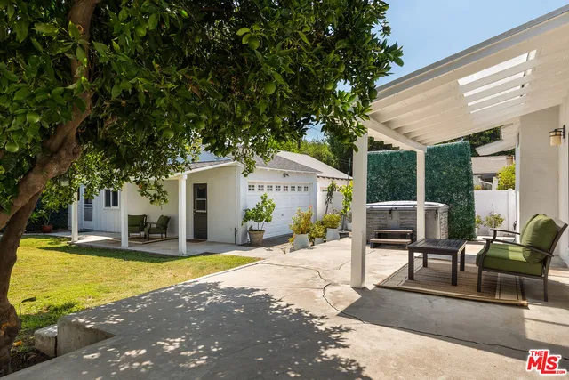 a house view with outdoor seating space