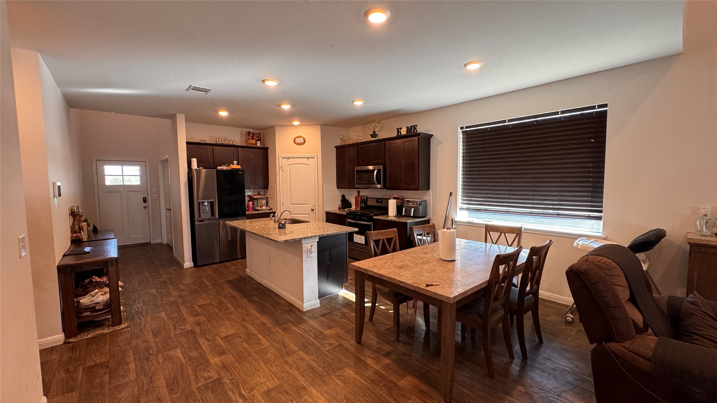 201 Finley Rae Drive Georgetown, TX 78626 - Photo 4 of 17 A streamlined kitchen layout offers both island functionality and integrated dining space.