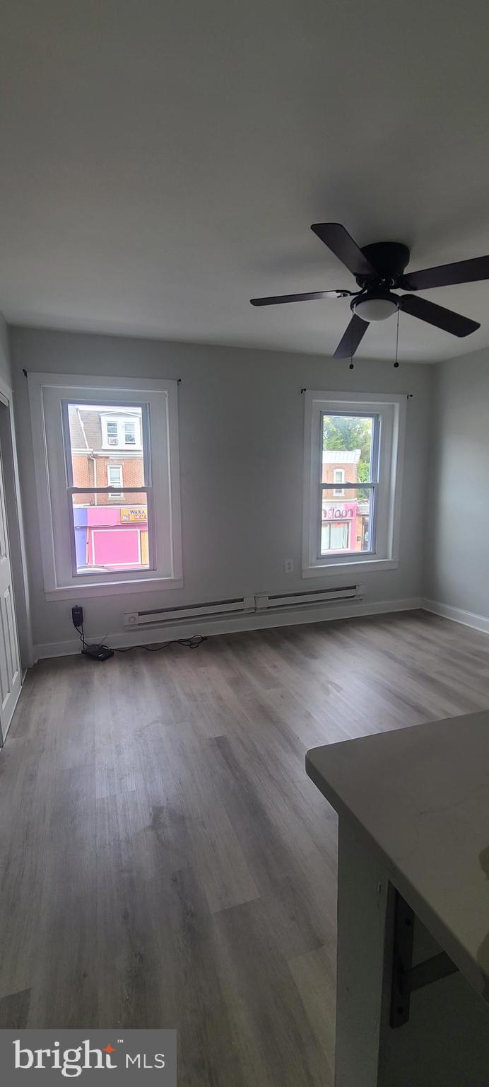 2026 Edgmont Avenue Chester, PA 19013 - Photo 2 of 11 an empty room with windows