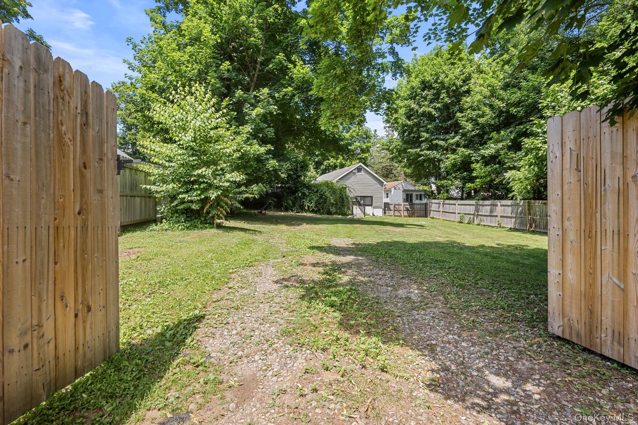 10 Batavia Road Patterson, NY 12563 - Photo 30 of 42 Yard view from fence entry used to park your vehicle for convenience.