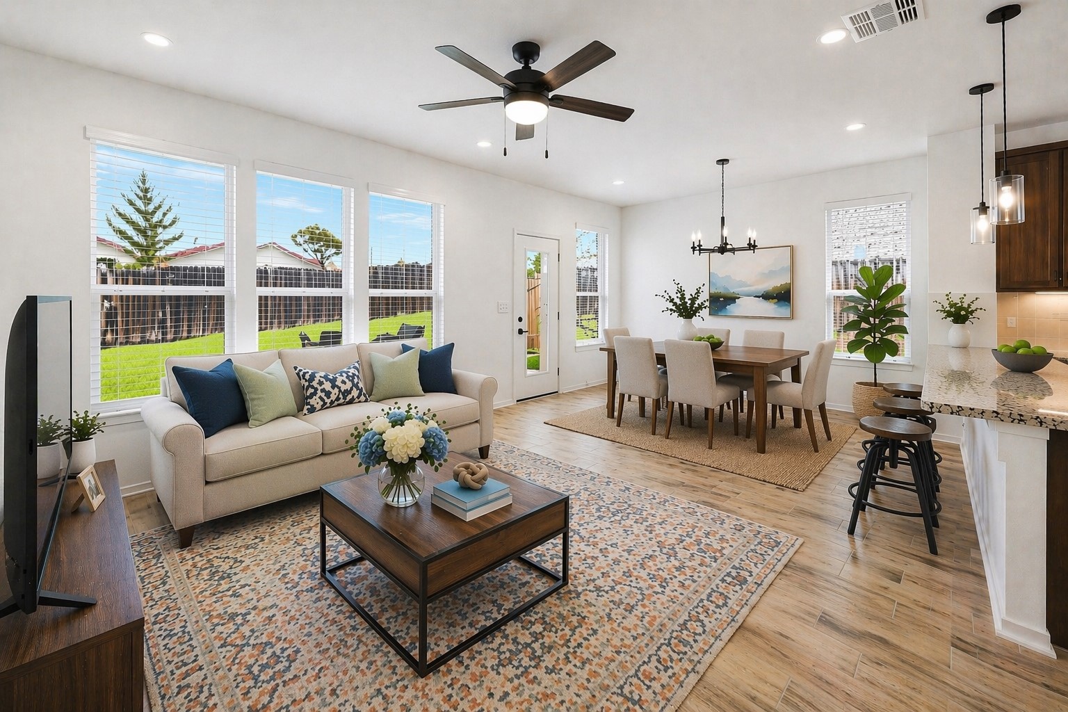 7201 Calliope Crossing Austin, TX 78744 - Photo 6 of 22 a living room with furniture a dining table and a rug