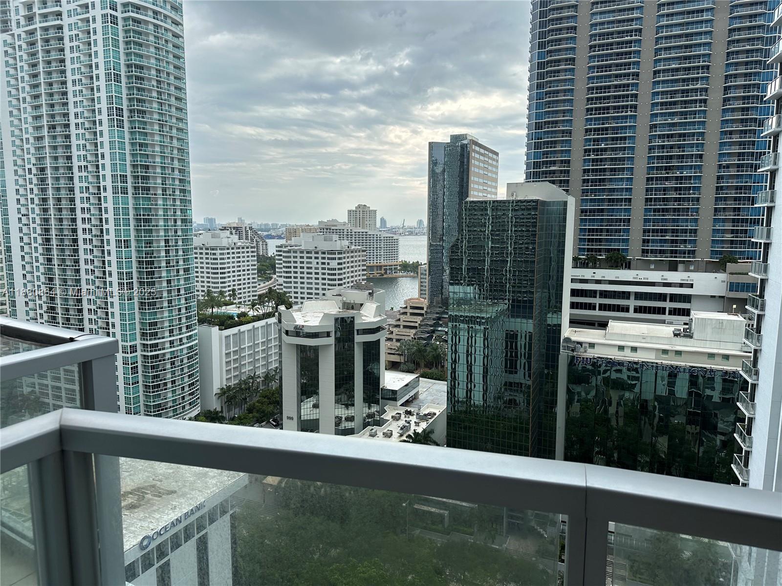 1050 Brickell Avenue, Unit 2206 Miami, FL 33131 - Photo 7 of 9 a view of a balcony with city view